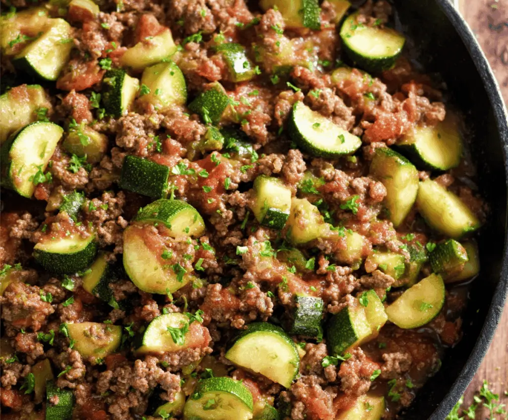 Delicious Ground Beef and Zucchini Skillet served in a bowl, featuring sautéed ground beef with fresh zucchini slices and herbs for a healthy, savory meal.